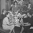 Dolls and Toys Under a Christmas Tree