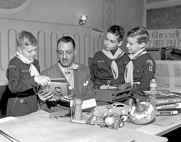 Boy Scouts Donate Gifts to the Santa Claus Girls