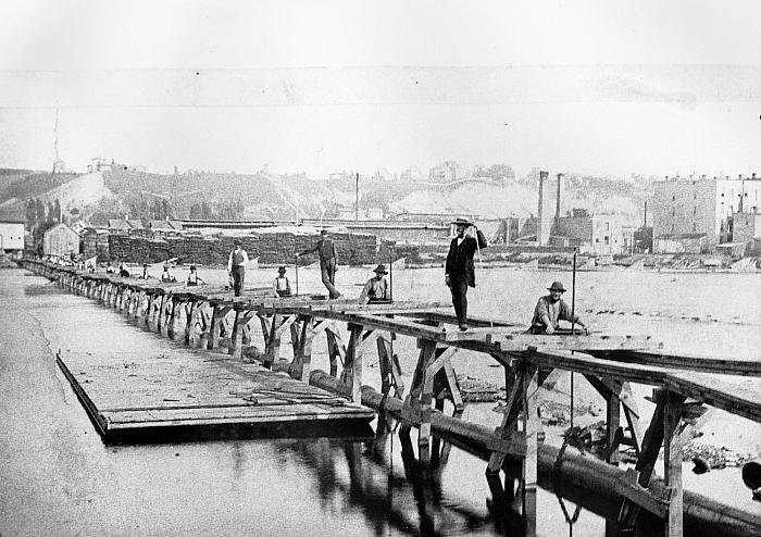 Laying Water Pipeline Beneath the Grand River