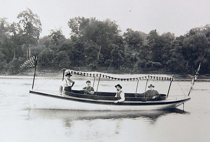 Jesiek Boat with Canopy on River