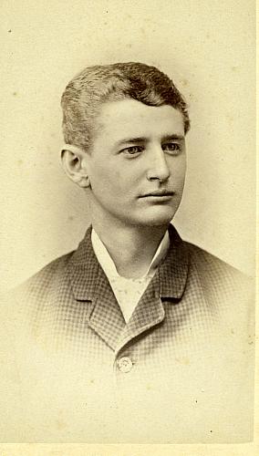 Young man in checkered jacket